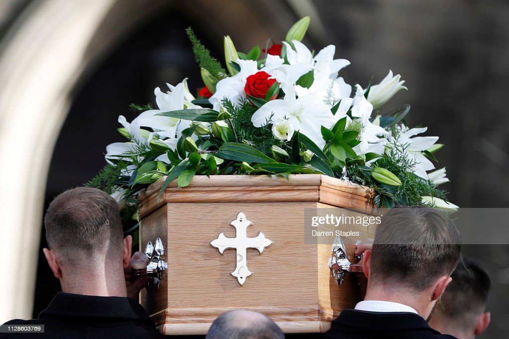 Pallbearers help carry the coffin of recently deceased former England goalkeeper Gordon Banks outside Stoke Minster on March 4, 2019 in Stoke,...