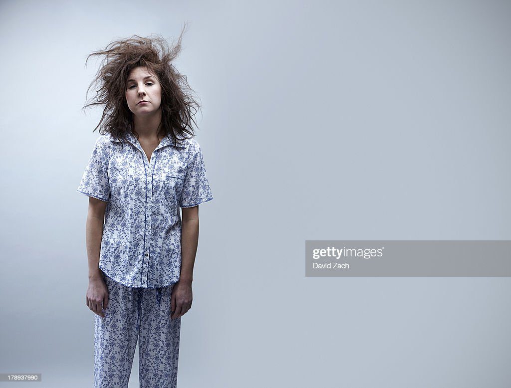 young woman in pajamas, portrait - pijama fotografías e imágenes de stock